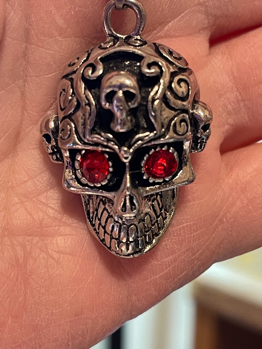 Skull Pendant with Red Gem Eyes.Skull on forehead. NWOT